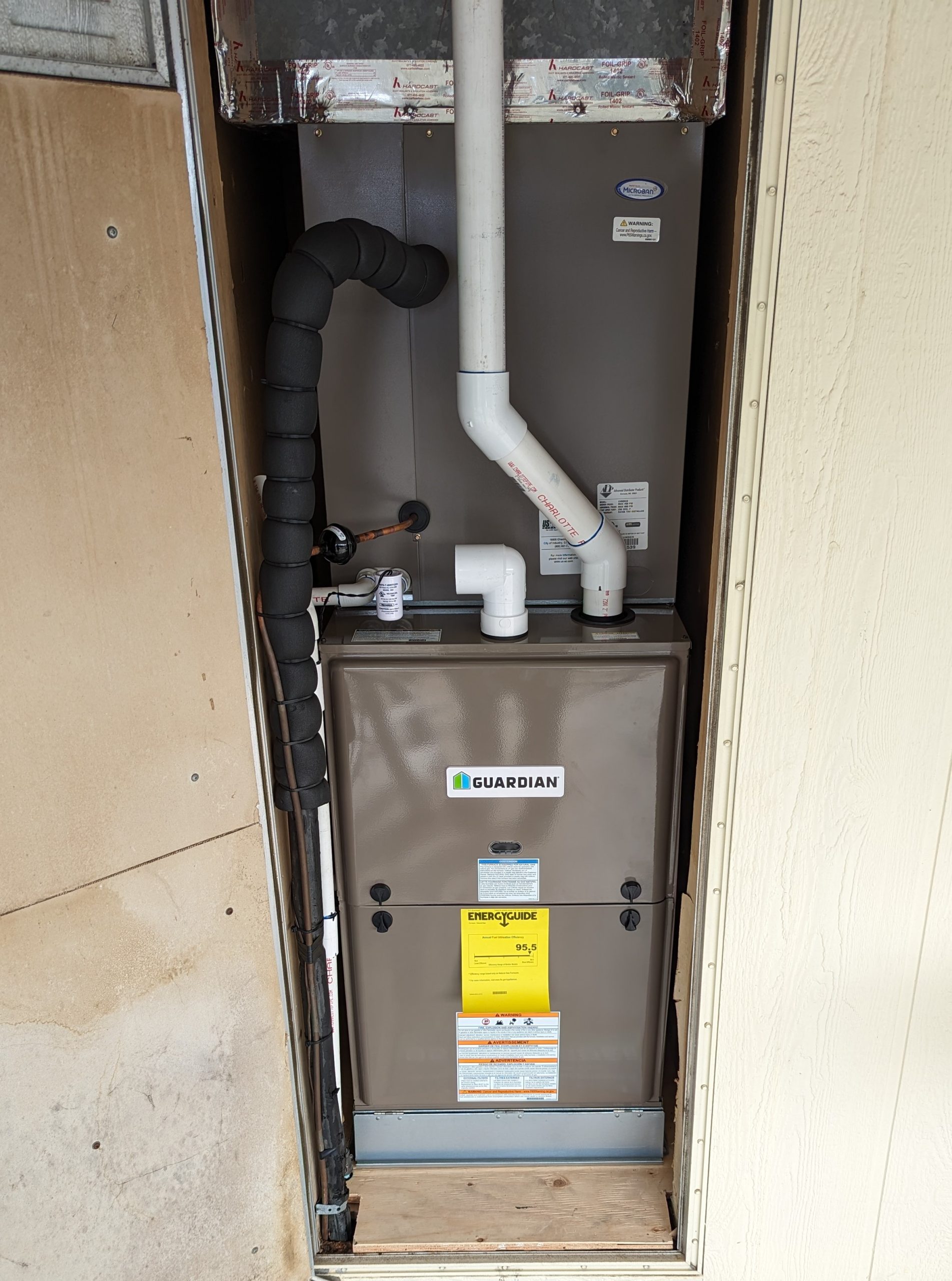 Manufactured home upflow 90% high-efficiency furnace installed in hallway niche by AirTight Air in Murrieta, CA